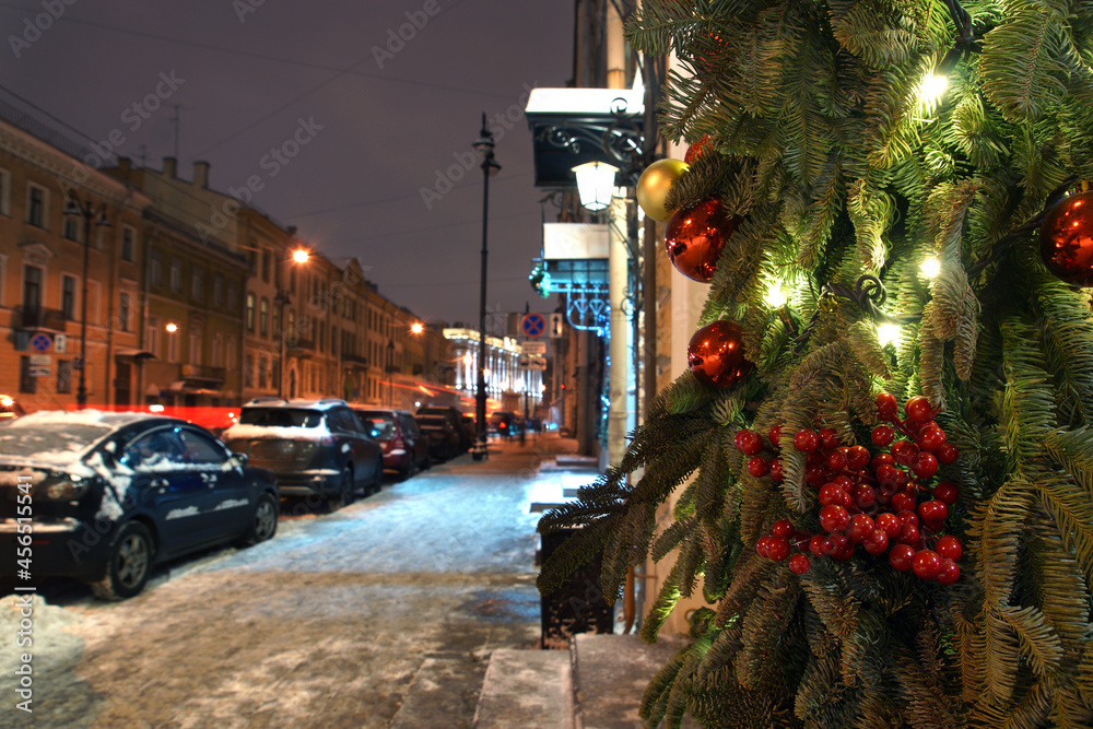 Christmas decoration on snowy city street in winter