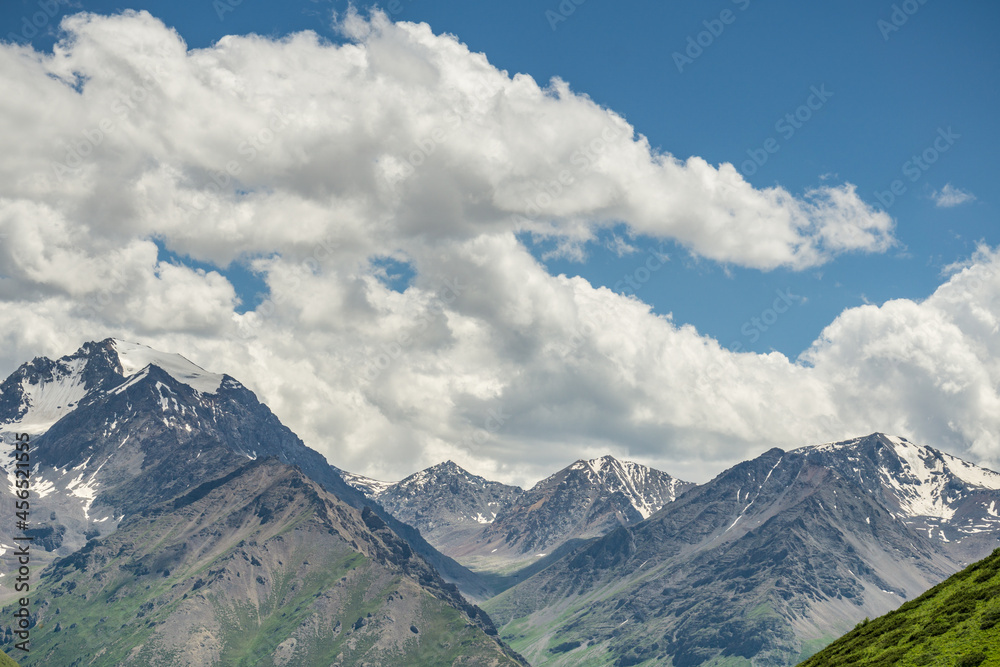 Mountains and grasslands along G217 highway in Xinjiang, China in summer