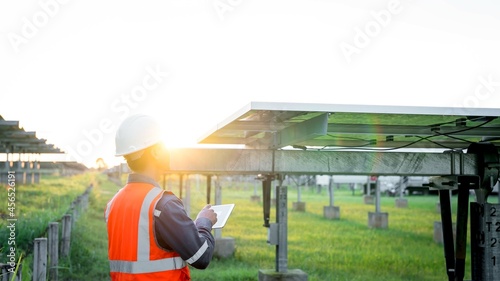 Wallpaper Mural The solar farm(solar panel) with engineers check the operation of the system, Alternative energy to conserve the world's energy, Photovoltaic module idea for clean energy production Torontodigital.ca