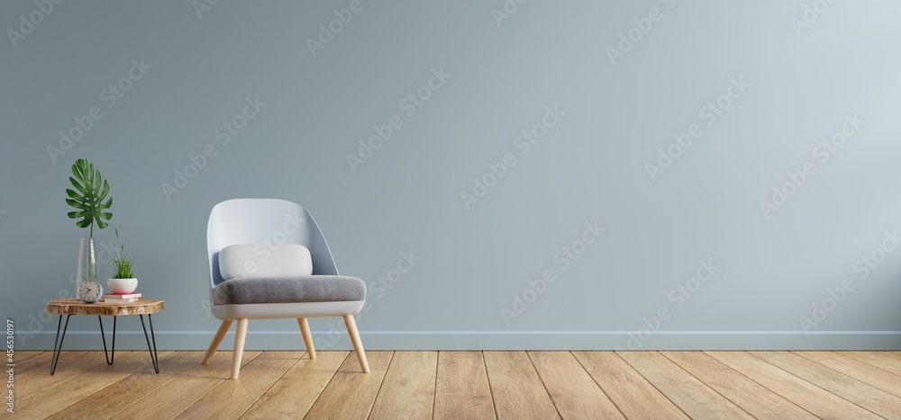 Armchair and wooden table in living room interior,blue wall. - obrazy, fototapety, plakaty 