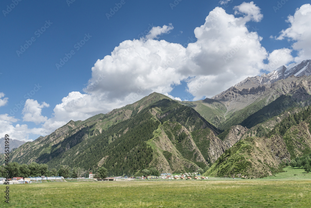 Mountains and grasslands along G217 highway in Xinjiang, China in summer