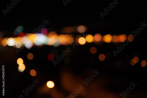 Night bokeh city lights black background