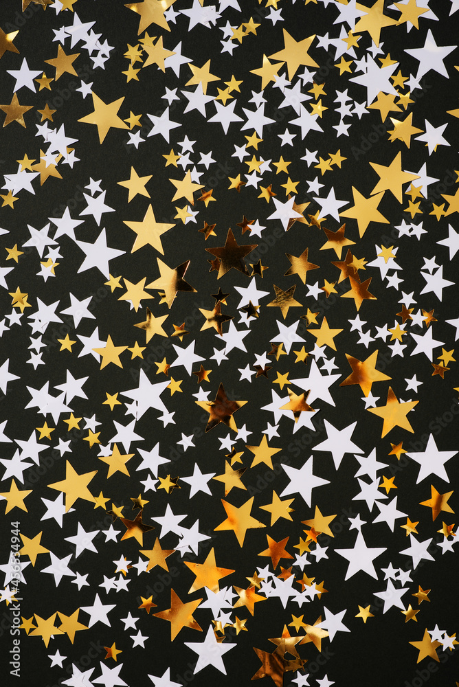 Christmas or birthday stars background, gold and black glow Christmas or birthday stars background, gold and black glow