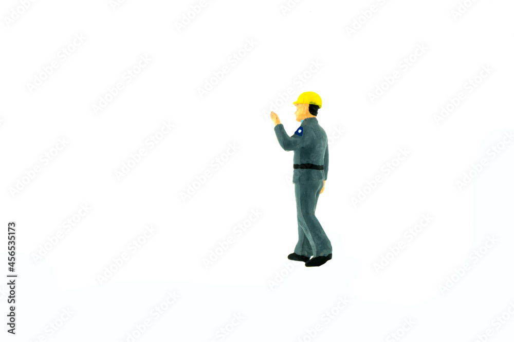 Miniature people engineer worker construction concept on white background Miniature people engineer worker construction concept on white background