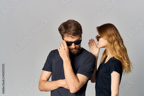 fashionable man and woman socializing together posing fashion studio lifestyle