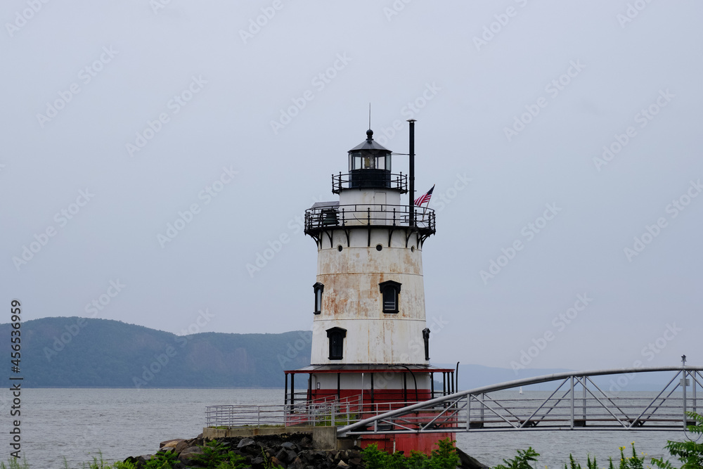 The Tarrytown Lighthouse abandoned and empty on the Hudson River in New York State