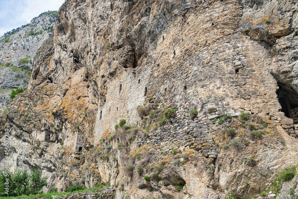 The wall of an ancient defensive fortress in the mountains of North Ossetia