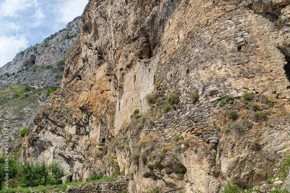 The wall of an ancient defensive fortress in the mountains of North Ossetia