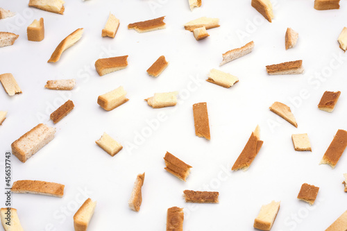 Scattered crumbs isolated on white background
