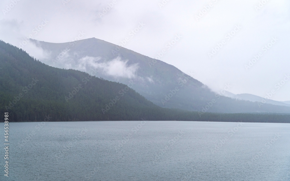 mountain lake in the fog