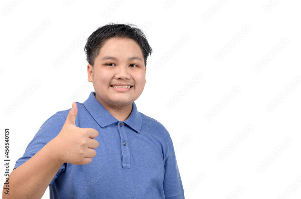 Portrait of asian happy fat boy showing thumbs up gesture, isolated Portrait of asian happy fat boy showing thumbs up gesture, isolated
