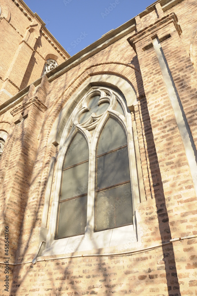 Fototapeta premium Small neogothic window on Lourdes Basilica's wall