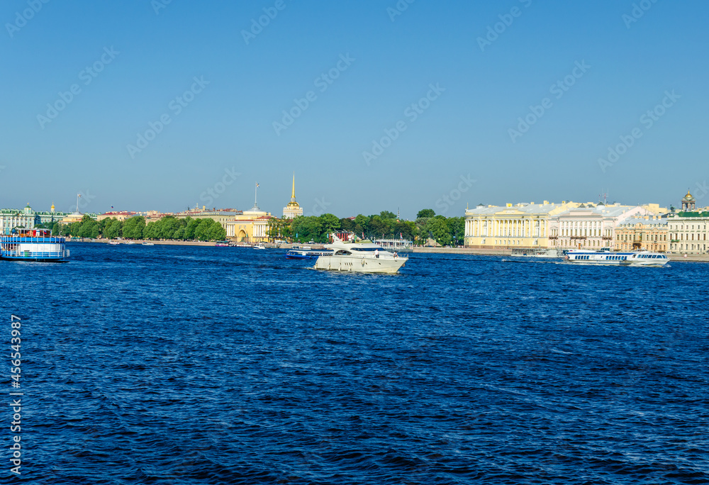 View of the Neva River with boats on a summer day.