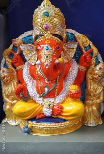 Hindu God Ganesha. Ganesha Idol on plain background. © Raksha