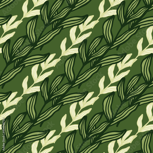 Creative forest branch with leaves seamless pattern on green background.