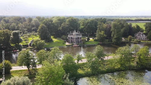 Aerial drone view of the river Nes Stichtse Vecht between Amsterdam and Utrecht with historic houses villa, along the water. photo