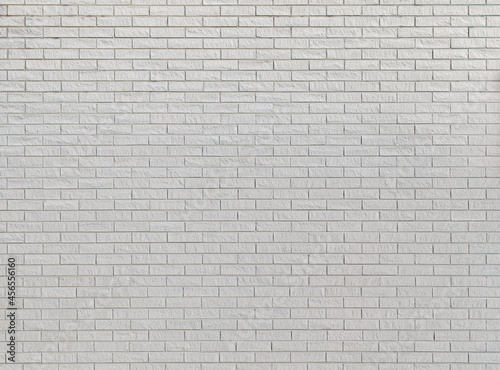 White new brick wall viewed from the front. High resolution full frame textured background. Copy space.