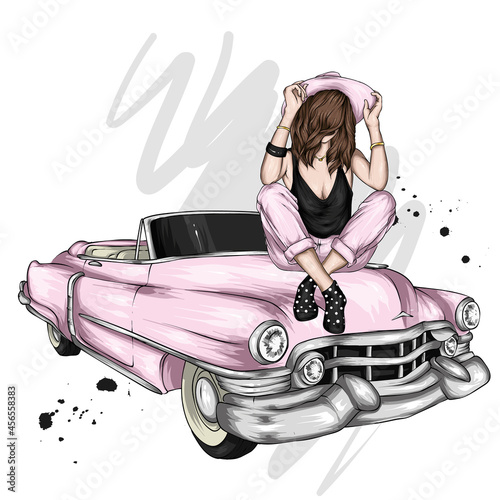 Beautiful girl in stylish clothes and a retro car. Vintage. Fashion and style, clothing and accessories, makeup.