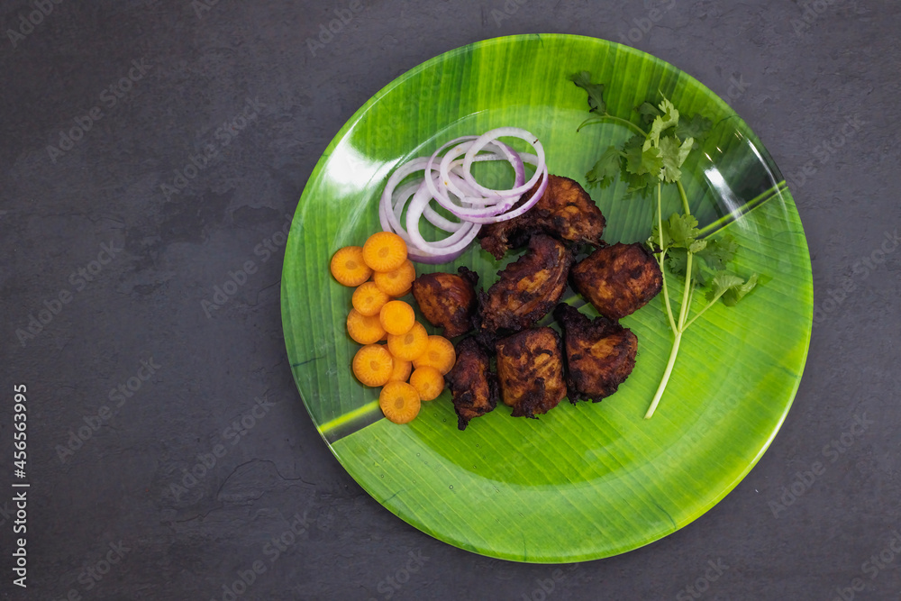 Famous South Indian non veg appetizer snack chicken 65. Top view of