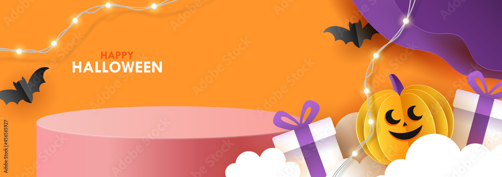 Fototapeta premium Halloween holiday banner design with product display podium and paper art pumpkin background.