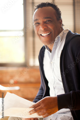 Фотография Man posing with charismatic smile and look of happiness