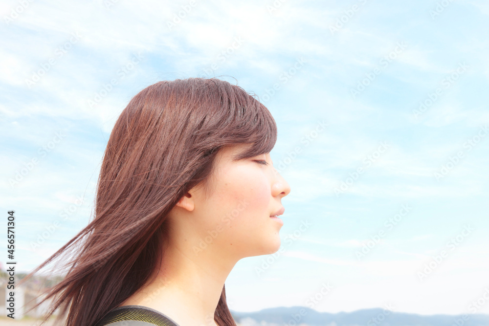 Profile of young woman with eyes closed Profile of young woman with eyes closed