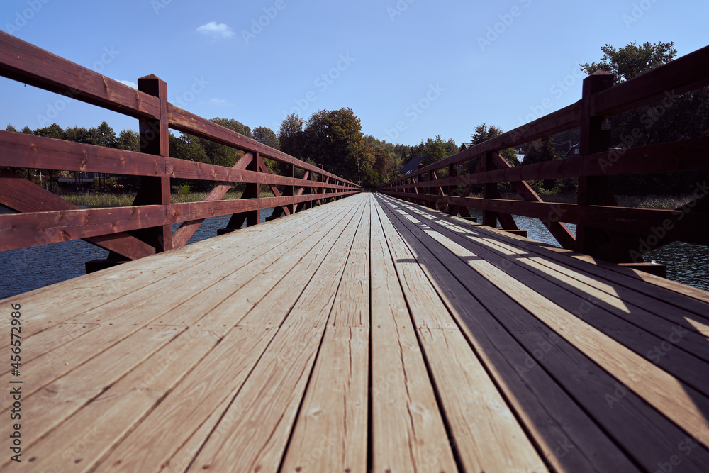 Fototapeta premium A view from a wooden bridge