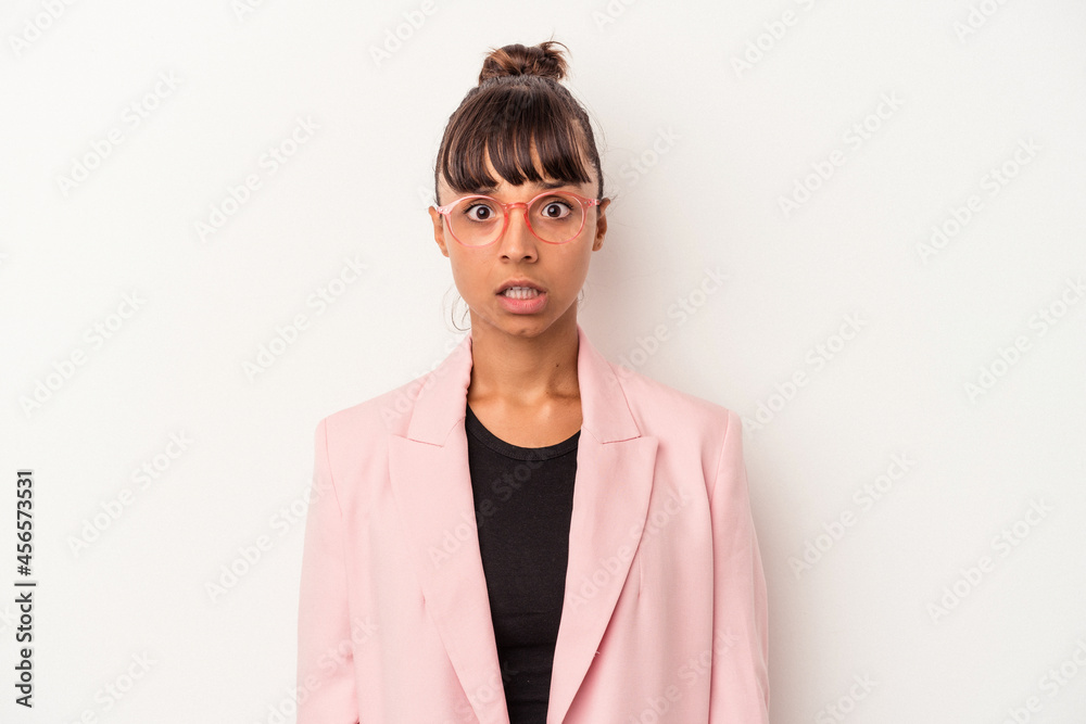 Young mixed race woman isolated on white background  sad, serious face, feeling miserable and displeased.