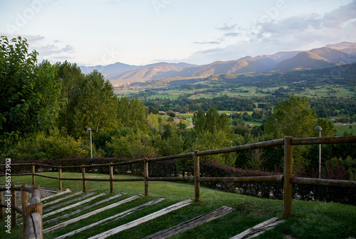 Wooden stairs in the countryside overlooking the mountains