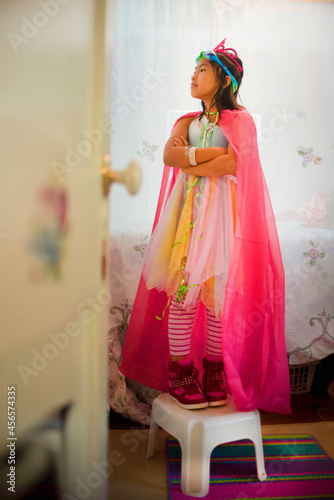 Obraz na plátne Young girl wearing fancy dress costume