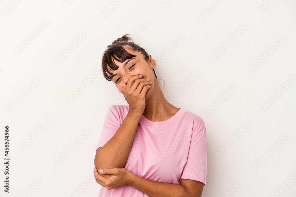 Young mixed race woman isolated on white background laughing happy, carefree, natural emotion. Young mixed race woman isolated on white background laughing happy, carefree, natural emotion.