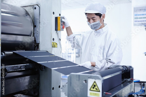 Worker at e-cigarettes battery factory, Guangdong, China