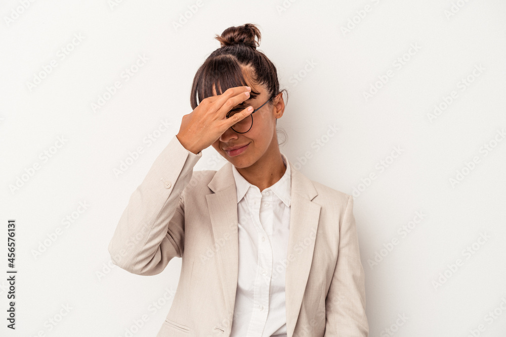Young mixed race woman isolated on white background touching temples and having headache. Young mixed race woman isolated on white background touching temples and having headache.