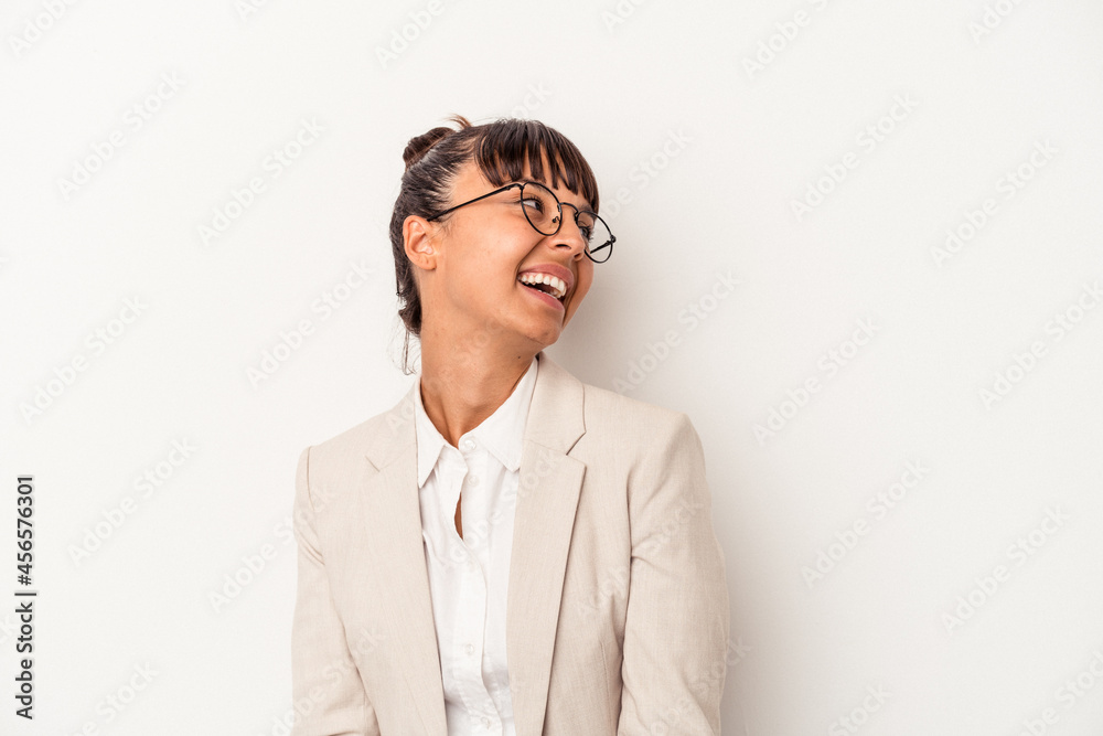 Young mixed race woman isolated on white background  relaxed and happy laughing, neck stretched showing teeth.