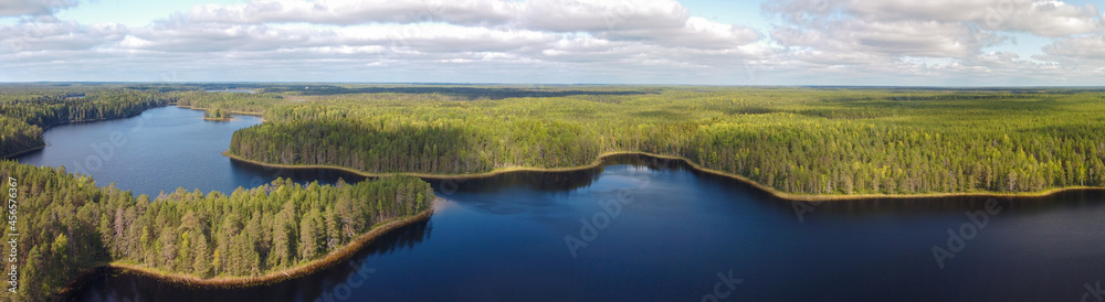 Aerial panorama with a beautiful forest lake. The system of Siya lakes, Arkhangelsk region, Russia.