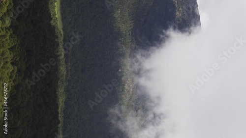 A vertical flipped view of Telapon Volcano in Mexico on a foggy day in 4K photo