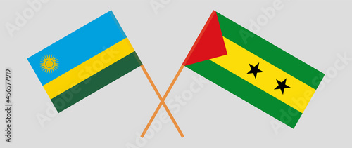 Crossed flags of Rwanda and Sao Tome and Principe. Official colors. Correct proportion
