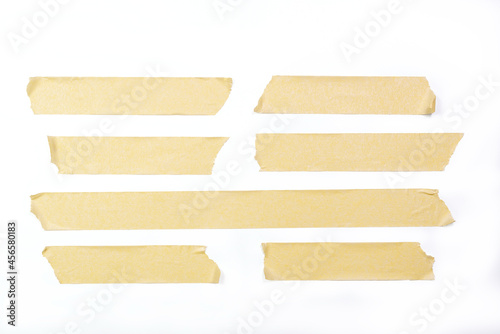 Adhesive tape pieces in line on white background, with cliping path