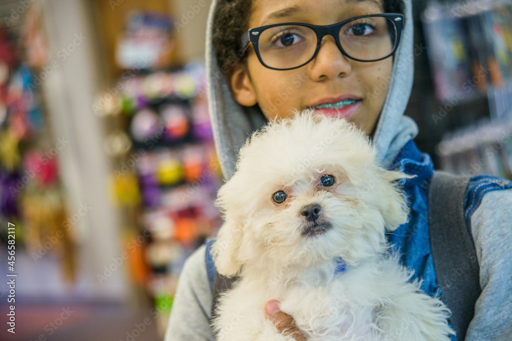 Boy holding puppy Boy holding puppy