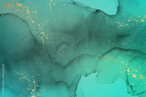 Modern watercolor background or elegant card design or wallpaper or poster with abstract green ink waves and golden splashes.