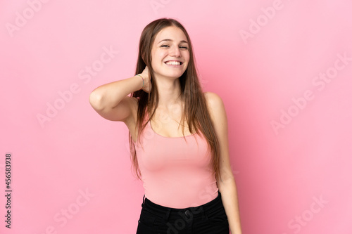 Young caucasian woman isolated on pink background laughing © luismolinero