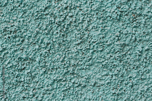 close up of turquoise plaster