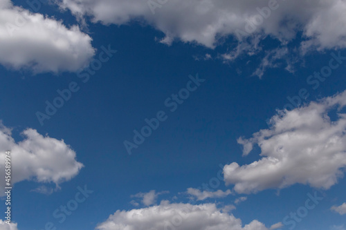 white fluffy clouds in a blue sky
