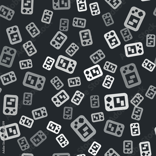 Grey Portable tetris electronic game icon isolated seamless pattern on black background. Vintage style pocket brick game. Interactive playing device. Vector
