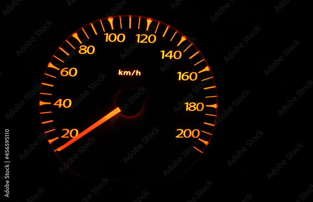 Speedometer car with yellow numbers on a black background Speedometer car with yellow numbers on a black background
