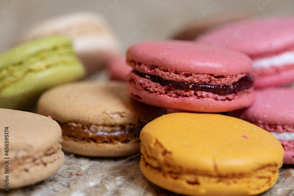 Colorful macaroons on light background