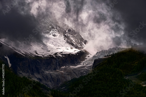 Alps mountains near Chamonix captured in spectacular black clouds before the storm. Chamonix-Mont-Blanc is a commune in the Haute-Savoie department in France