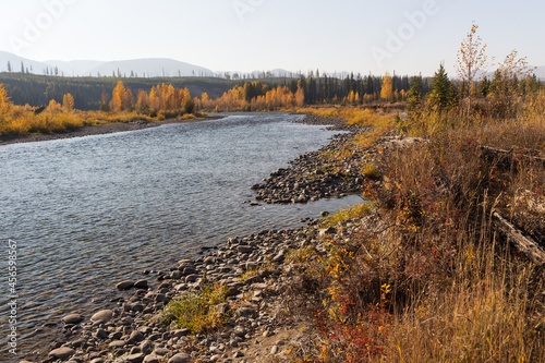 North Fork Flathead River and colorful Fall foliage, Glacier National Park, Montana, USA photo