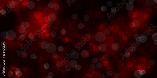 Dark Red vector background with circles.
