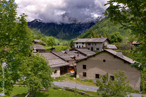Argentiere village with grey clouds in the mountain. Argentière is a picturesque skiing, alpine walking and mountaineering village in the French Alps,